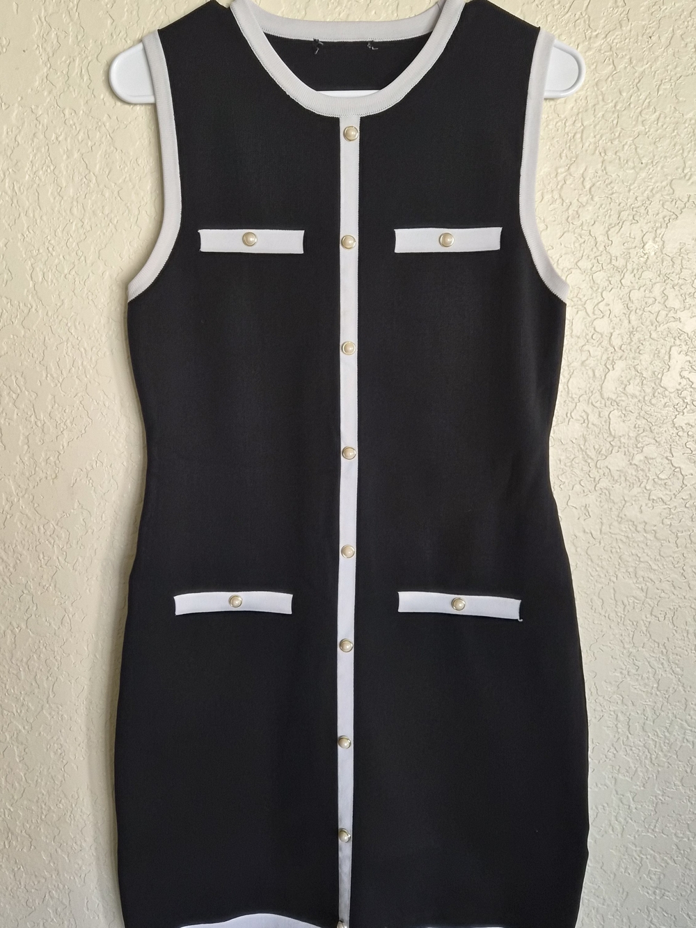 Sleeveless Black Dress with White Trim and Gold Buttons